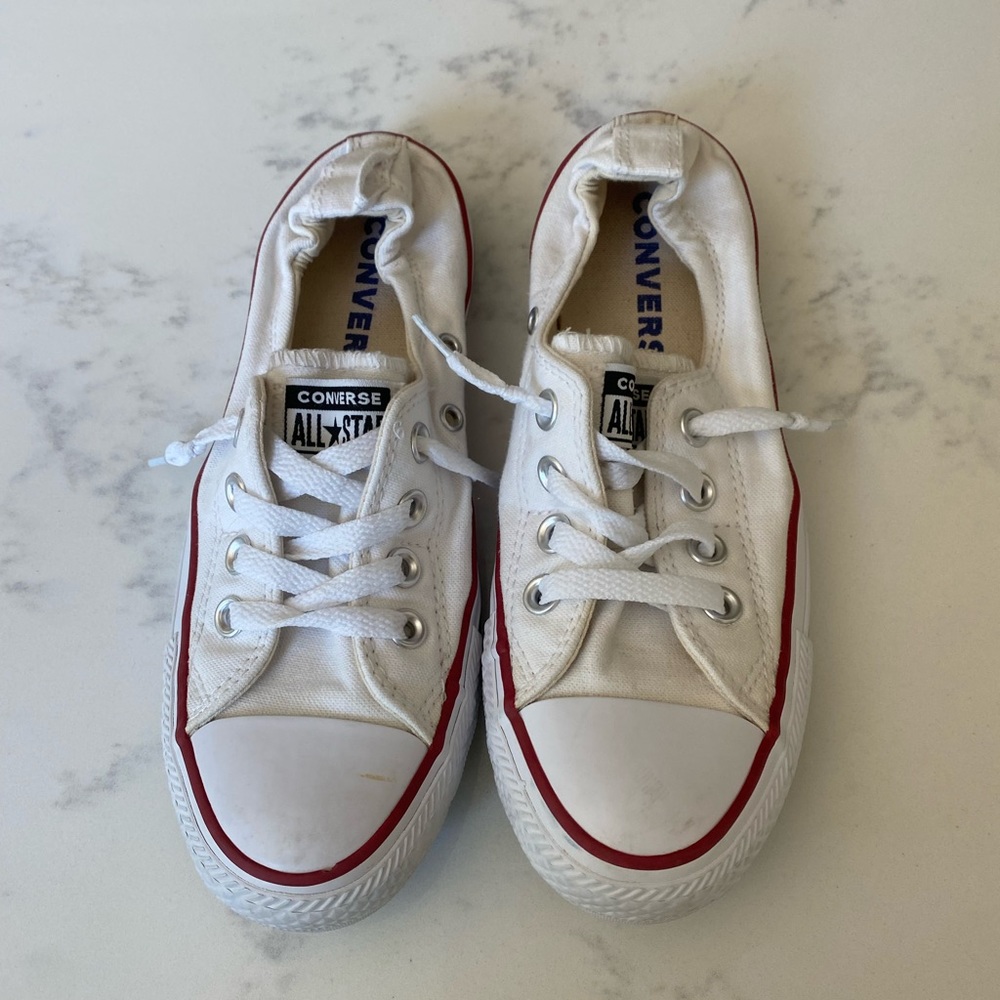 Womens slip on chuck taylors on white/cream color. Size 6.5